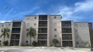 Full exterior view of condo building