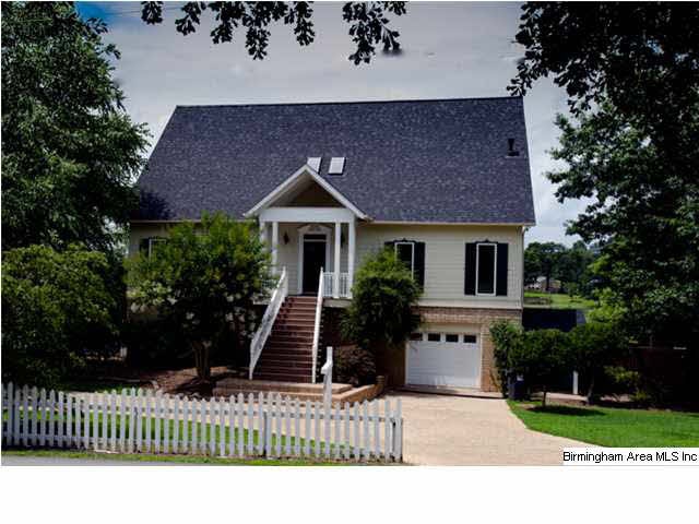 Front of the house with circular driveway