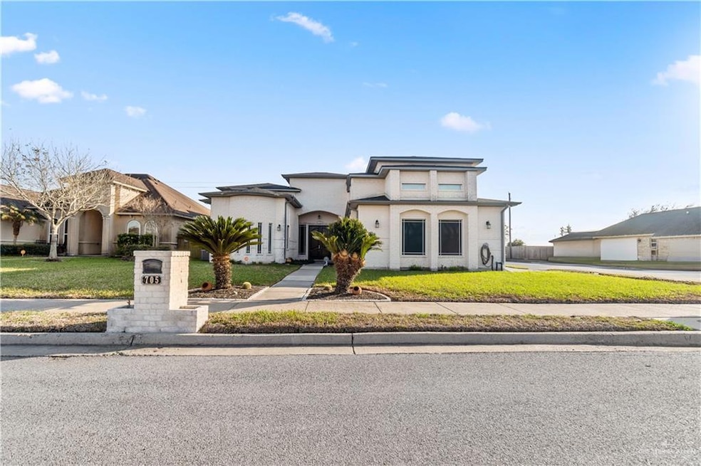 View of front of property featuring a front lawn