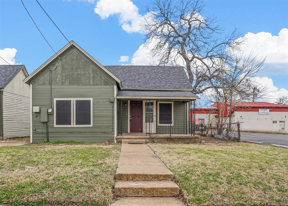 Bungalow-style house with a shingled roof, a front
