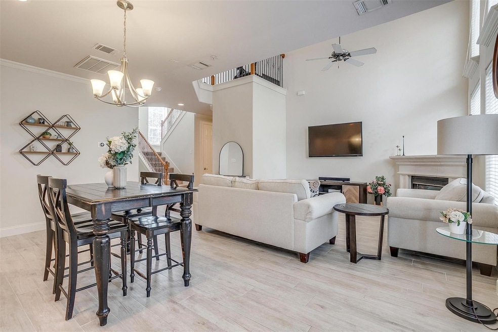 Bright and airy living room with soaring ceilings,