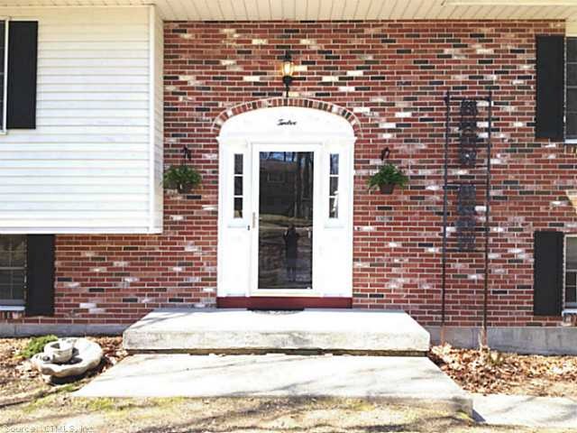 Facade/Exterior Front. Beautiful entry to this gra