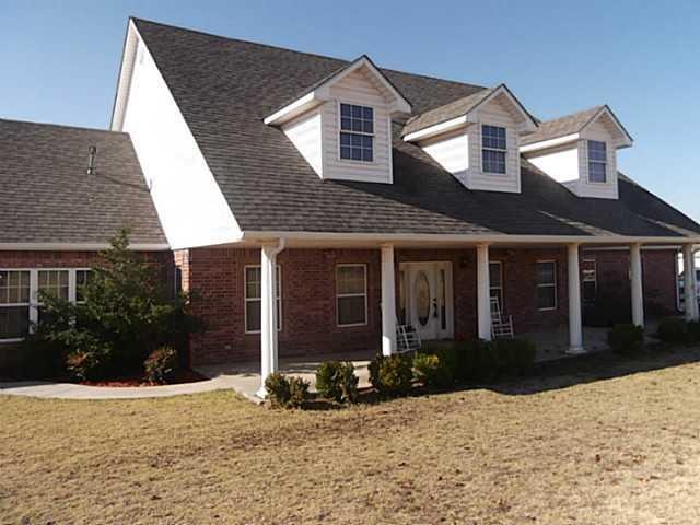 Exterior Front. Large covered front porch.