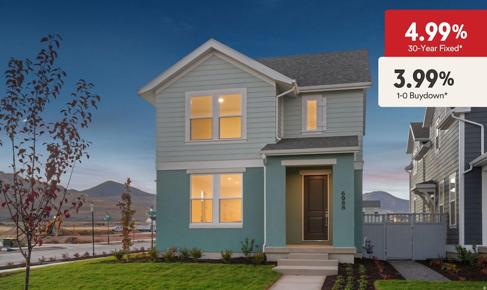View of front of house featuring a shingled roof, a mountain view, stucco siding, and a gate