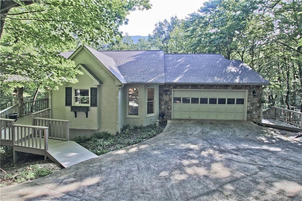 Front of this lovely home showing drive in 2 car g
