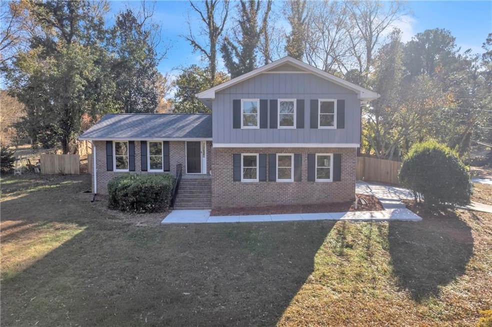 5618 Fern Creek Dr SW, Lilburn, GA 30047 - photo 1