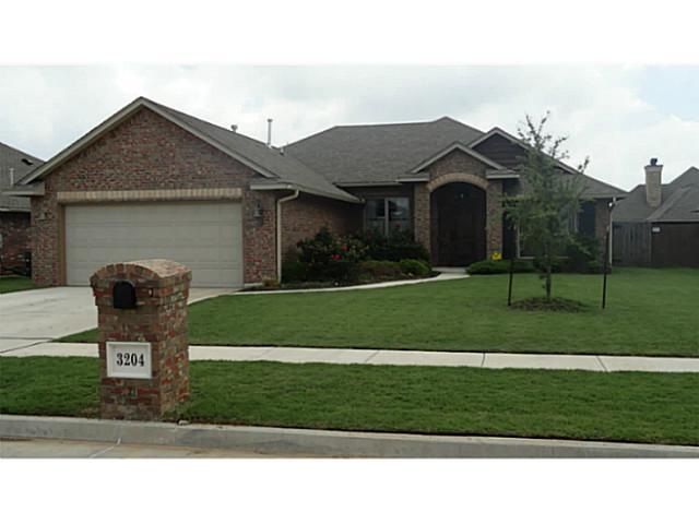 Exterior Front. Front yard has nice established la