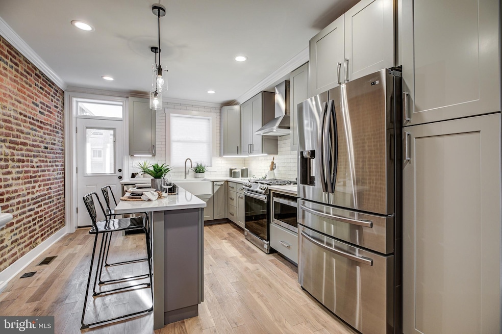 226 S Robinson St, Baltimore, MD 21224 - photo 1