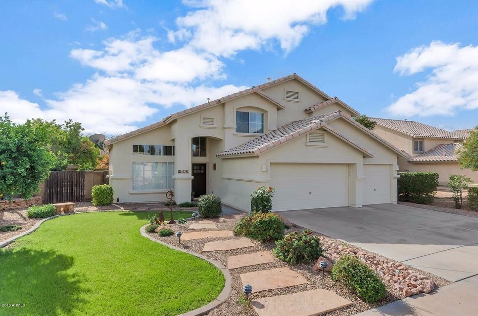 10735 W Adam Ave-large-002-9-Front Exter