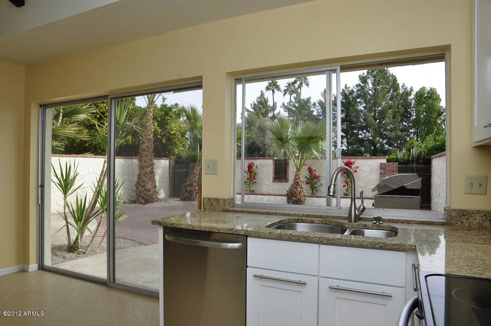 Elegant Kitchen with pass thu to Patio