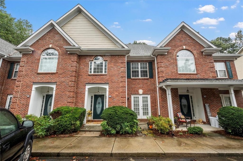 View of front of home featuring brick siding