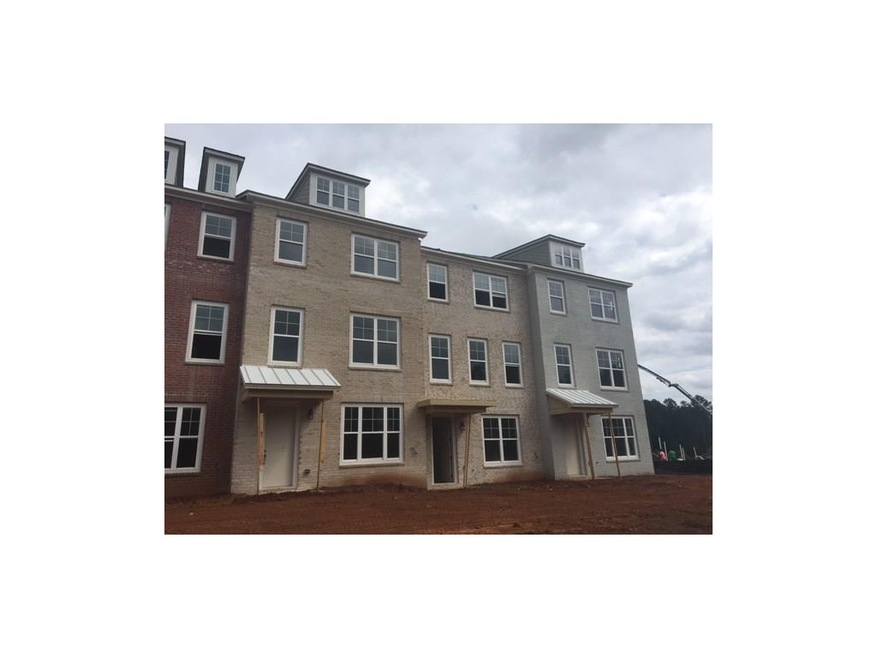Homesite 230 is a painted brick, interior unit.