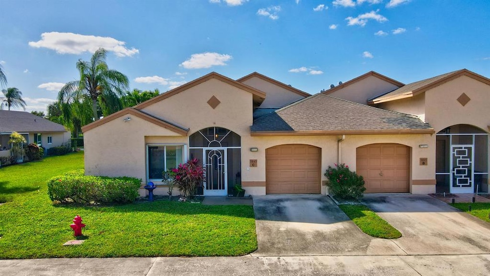 9845 Boca Gardens Cir N unit C, Boca Raton, FL 33496 - photo 1