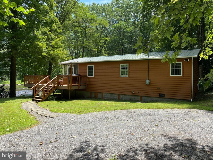 725 Running Waters Way, Great Cacapon, WV 25422 - photo 1