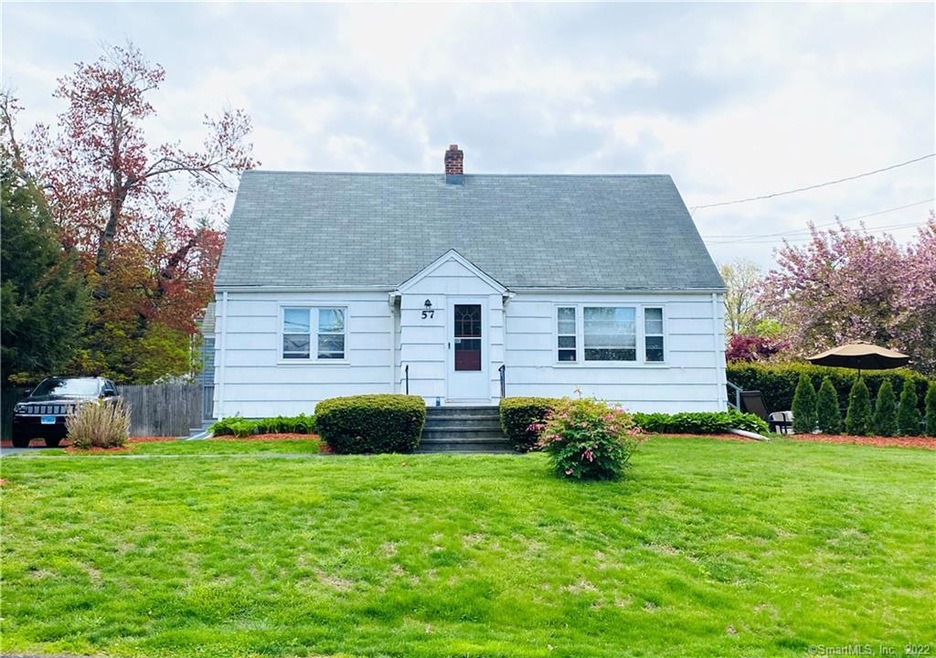Pretty white Cape in Fairfield .    Extra wide  dr