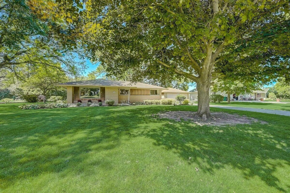 Juniper Ln front of house