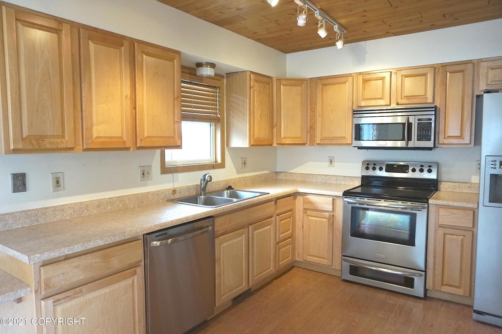 8740 Carter Cir, Anchorage, AK 99507 - photo 1