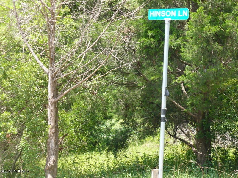 Partially wooded 2 acre corner lot