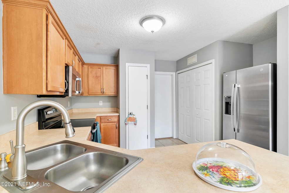 7737 Highchair Ln, Jacksonville, FL 32210 - photo 1