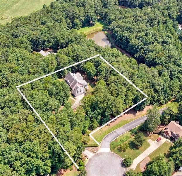 Enjoy your own 1.89 acre private oasis without mis
