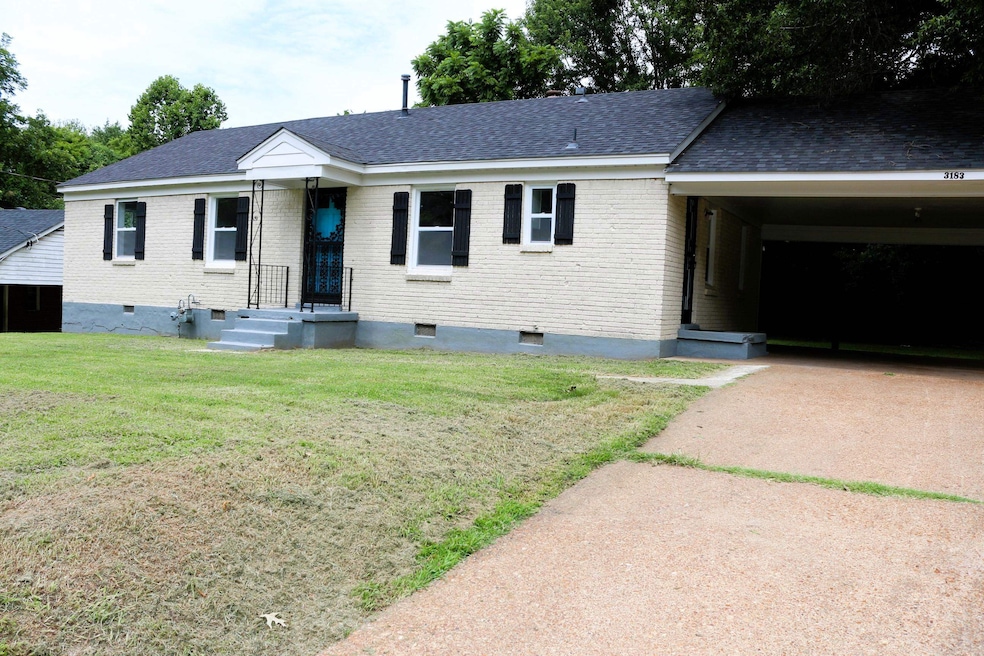 Ranch-style house featuring a carport and a front 