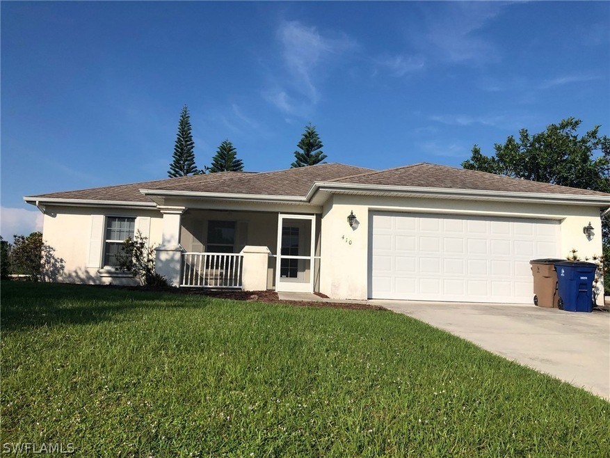 410 Conlee St, Lehigh Acres, FL 33974 - photo 1