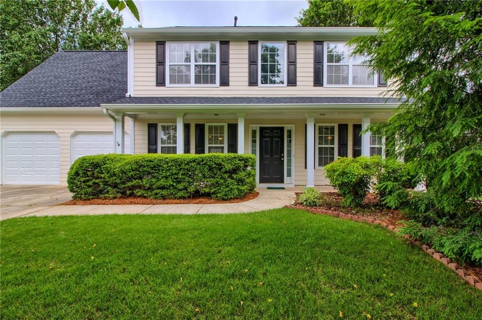 Wonderful curb appeal.  Lovely landscaping draws y