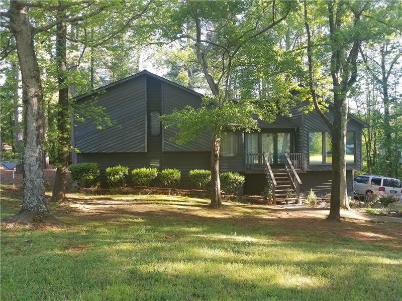 Beautiful landscaped corner lot...Just Imagine the
