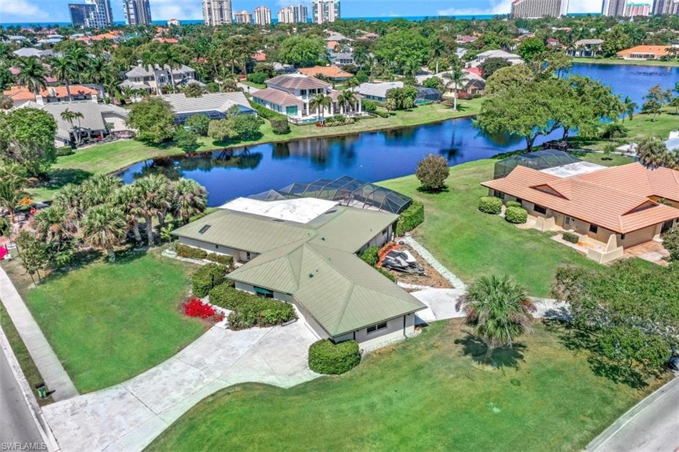 619 Neapolitan Way, Naples, FL 34103 - photo 1