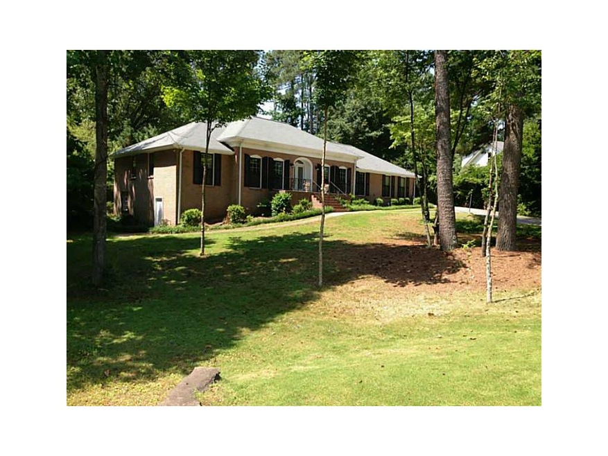 Exterior Front. Four sides brick Ranch with a base