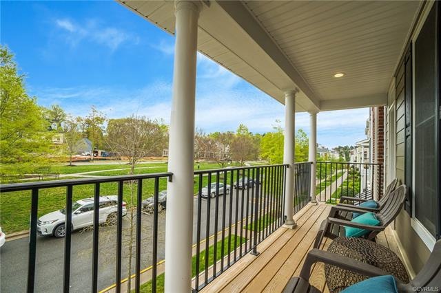 View of park from balcony just outside of dining room.  Perfect place for a morning cup of coffee or unwinding with a beverage after a full day.