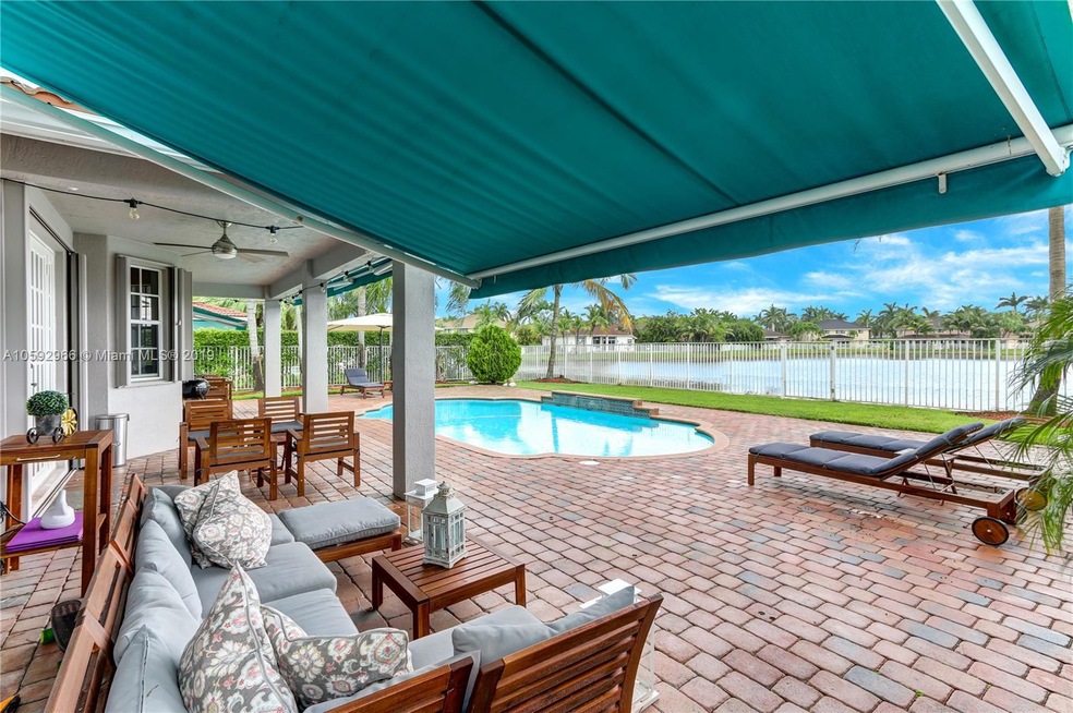 Covered patio, pool & lake