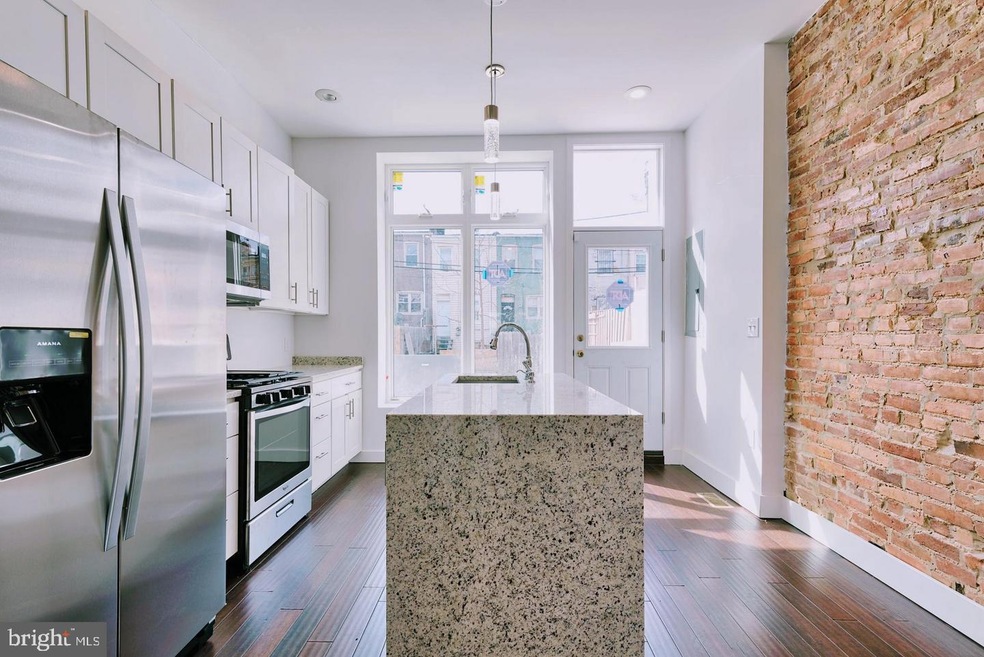 722 N Patterson Park Ave, Baltimore, MD 21205 - photo 1