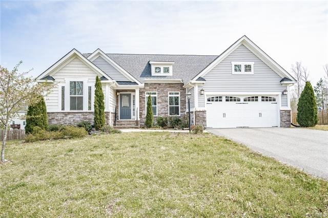 Beautiful vinyl-sided transitional ranch with stac