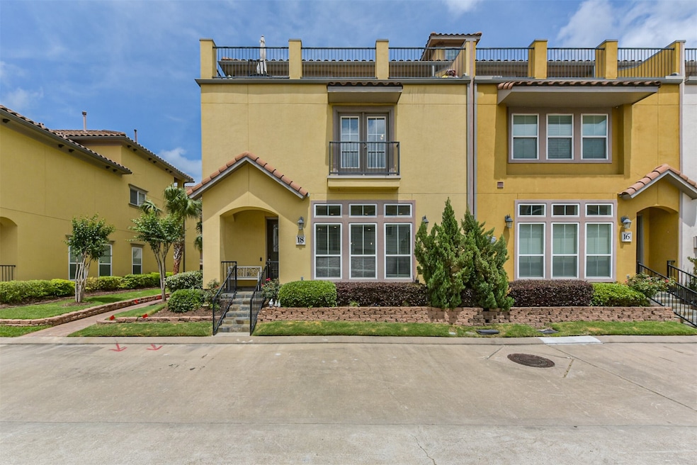 Stunning corner townhome located in a gated and wa