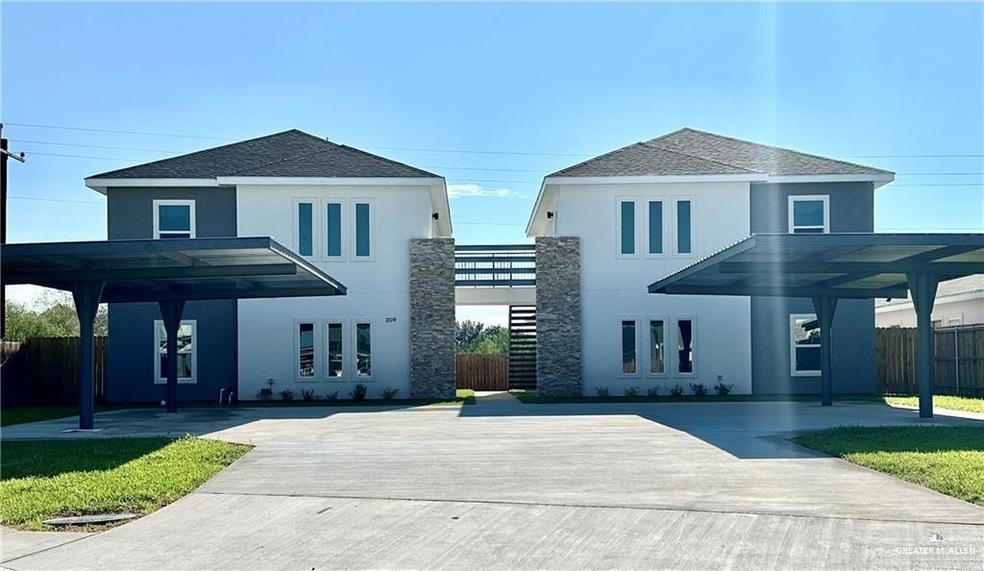 View of front of house with a carport and french doors