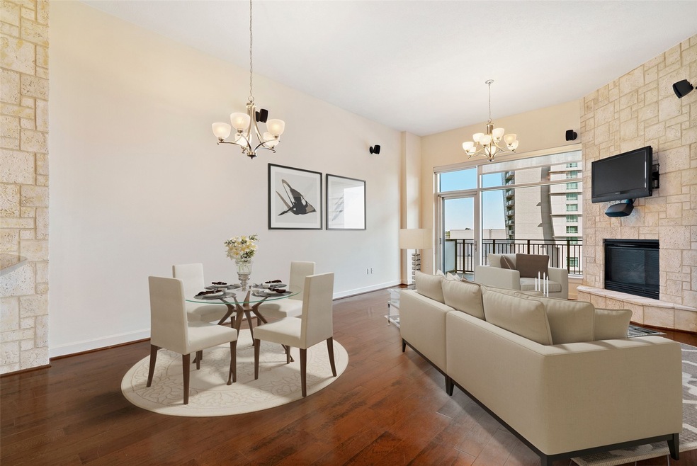 The open living area has the continuation of the 1