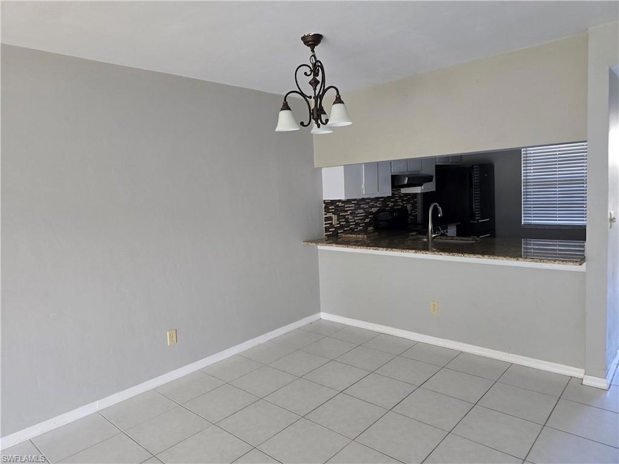 2660 Kings Lake Blvd unit 7-103, Naples, FL 34112 - photo 1