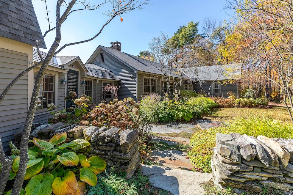 Entrance from Driveway to House with Beautifully-Crafted Stone Work