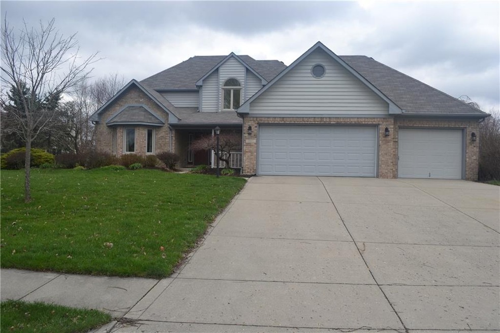Attractive custom home w/3-car garage.