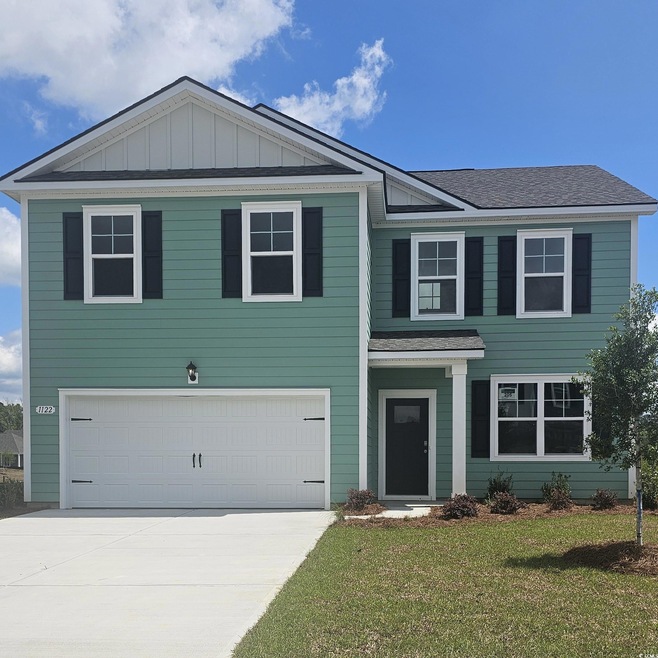 Traditional-style home with board and batten sidin