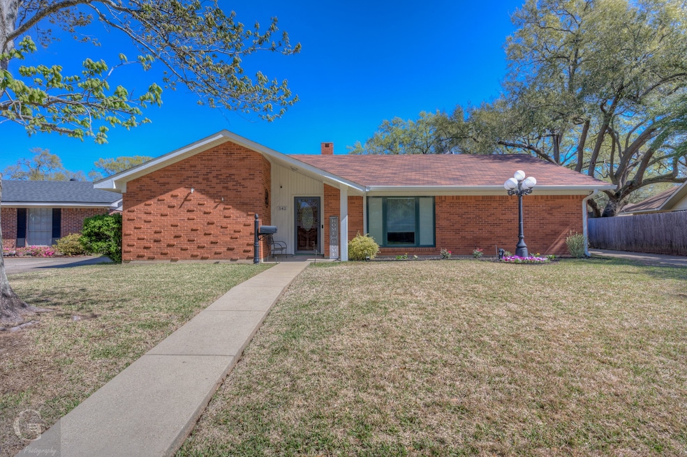 Great curb appeal. Extra lighting. Landscaped