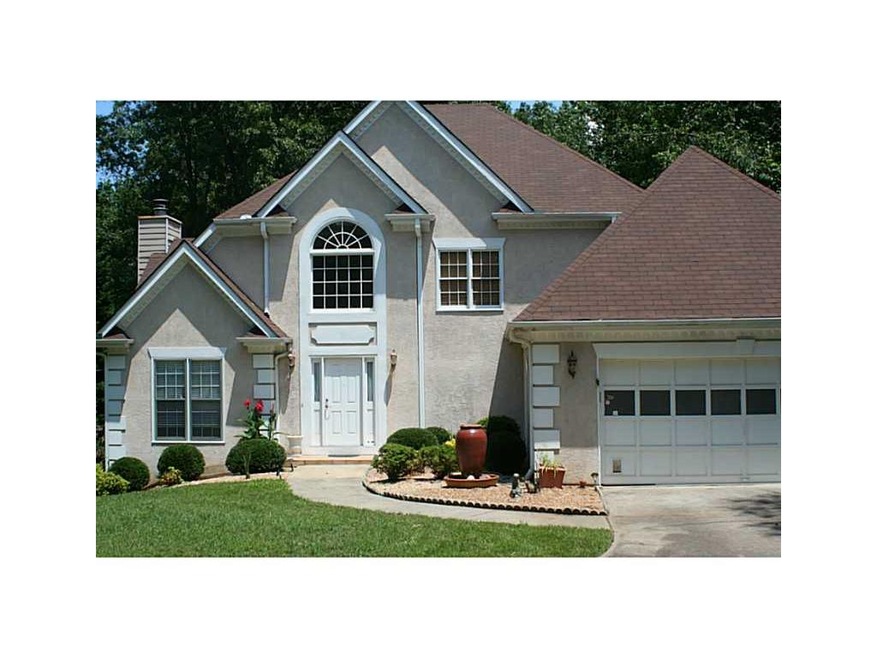 Exterior Front. Circular drive and 2 car garage!