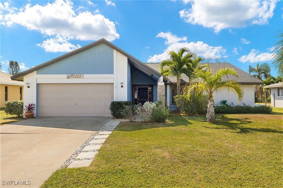 View of front of home featuring a garage and a fro