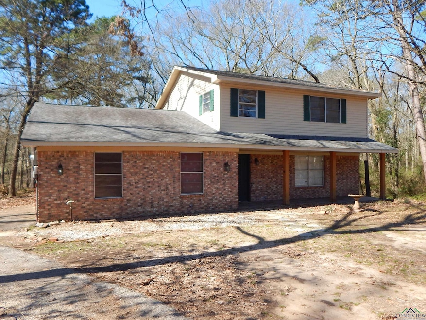 View of front of property featuring brick siding