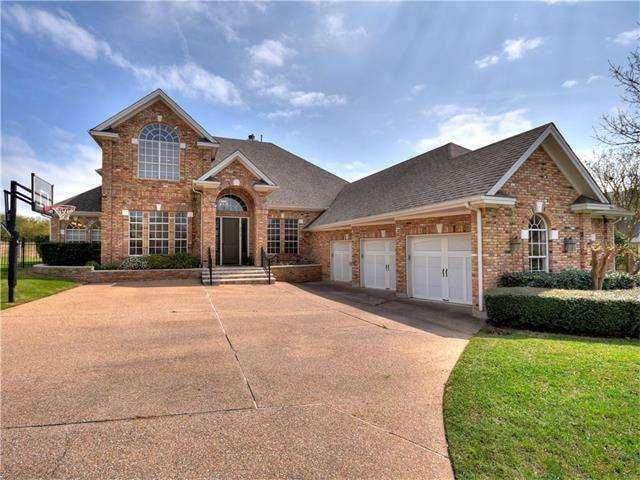 Large corner cul-de-sac lot with three car garage.