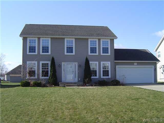 Exterior Front VINYL SIDED COLONIAL WITH ATTACHED 