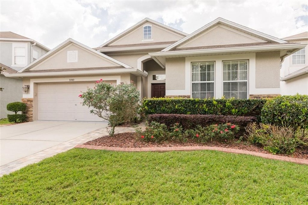 9749 Jasmine Brook Cir, Land O Lakes, FL 34638 - photo 1