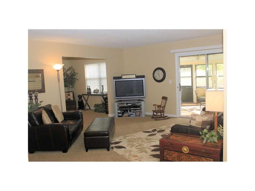 Living Room. Open to den and slider leads to 3 sea