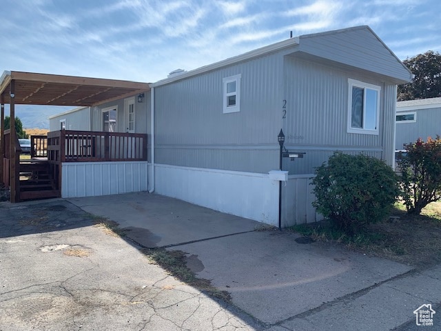 View of side and Front Entrance to this Beautiful Home with a covered porch.